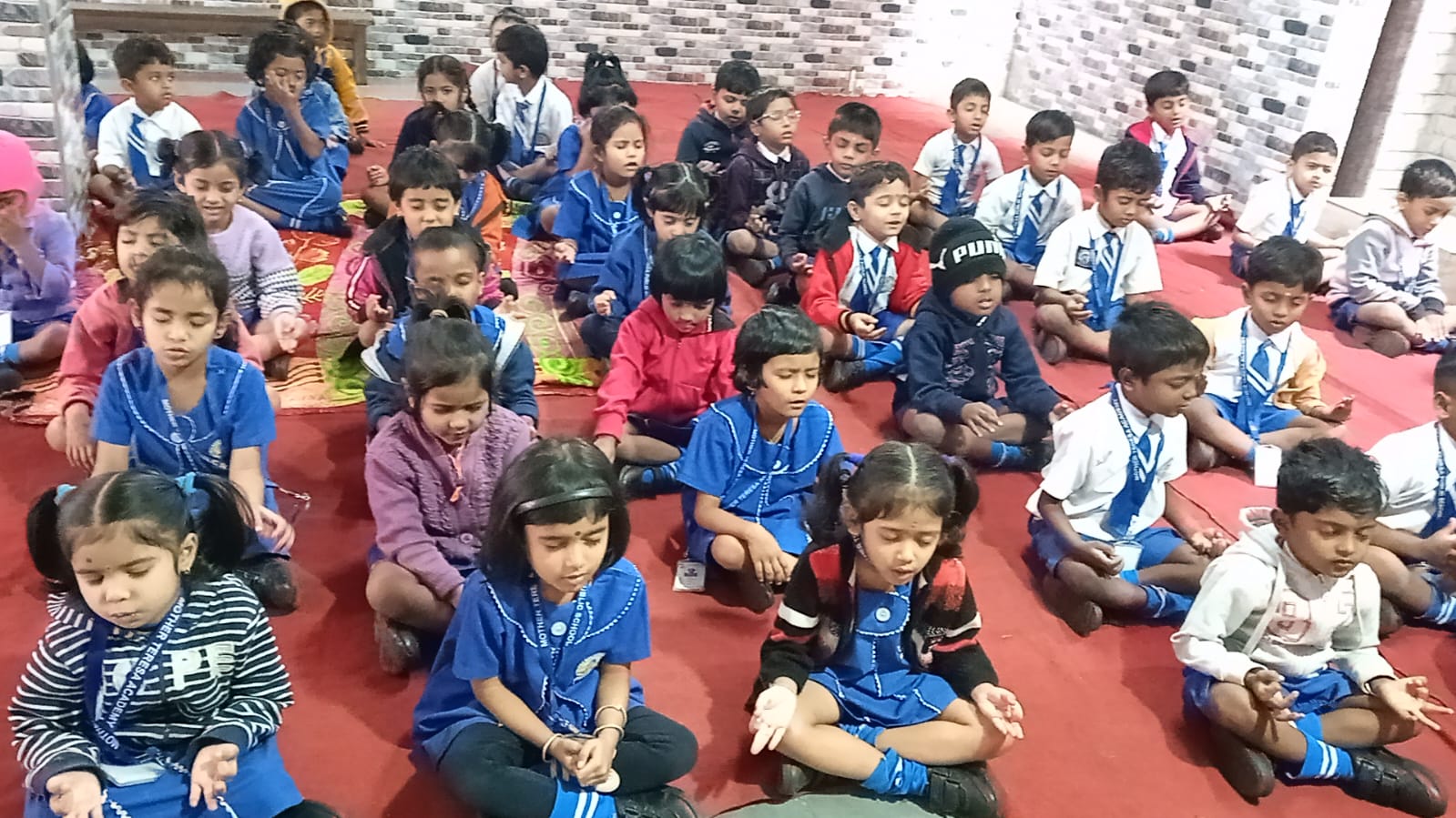 Students receiving prizes at the annual prize distribution ceremony