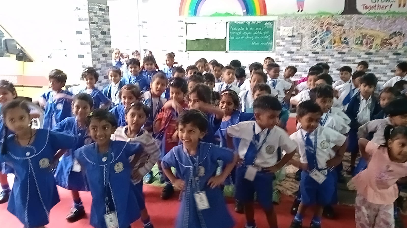 Students presenting science projects at school exhibition